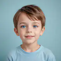 Young boy playing with Petra Play educational toy set.
