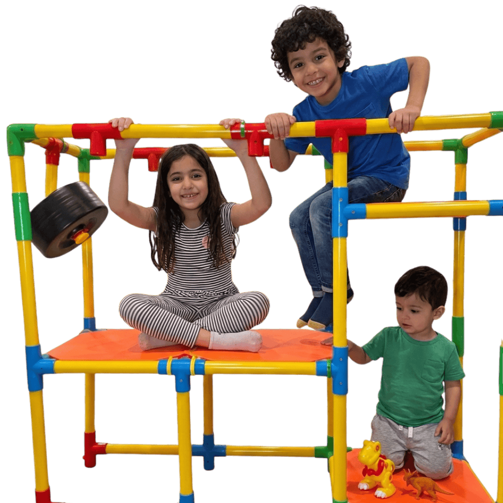 Colorful children's indoor play set with climbing frame and safety features.