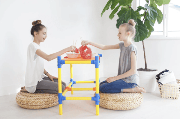 Kids playing with PetraPlay Ultimate Builder Set, creative construction toy for children.